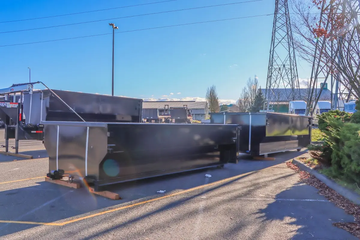 Roll-off dumpster ready for waste disposal at job site for Roofing Dumpster Rental in Mount Pleasant
